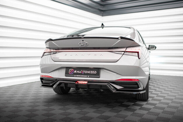Diffusor Heckansatz passend für Hyundai Elantra Mk7 schwarz Hochglanz